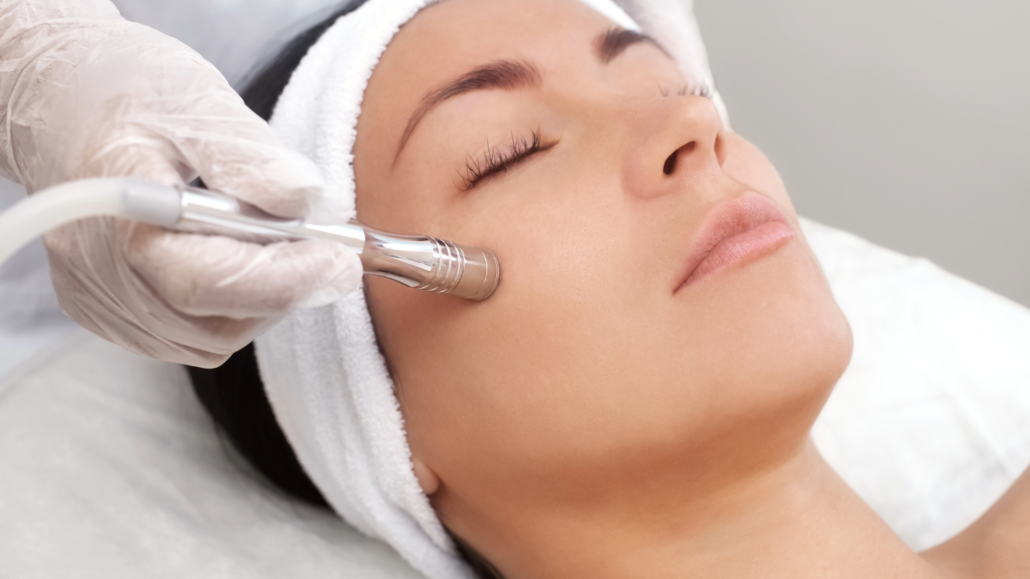 Microdermabrasion facial with a diamond wand on the cheek at Le-Pelle med spa in Walnut Creek